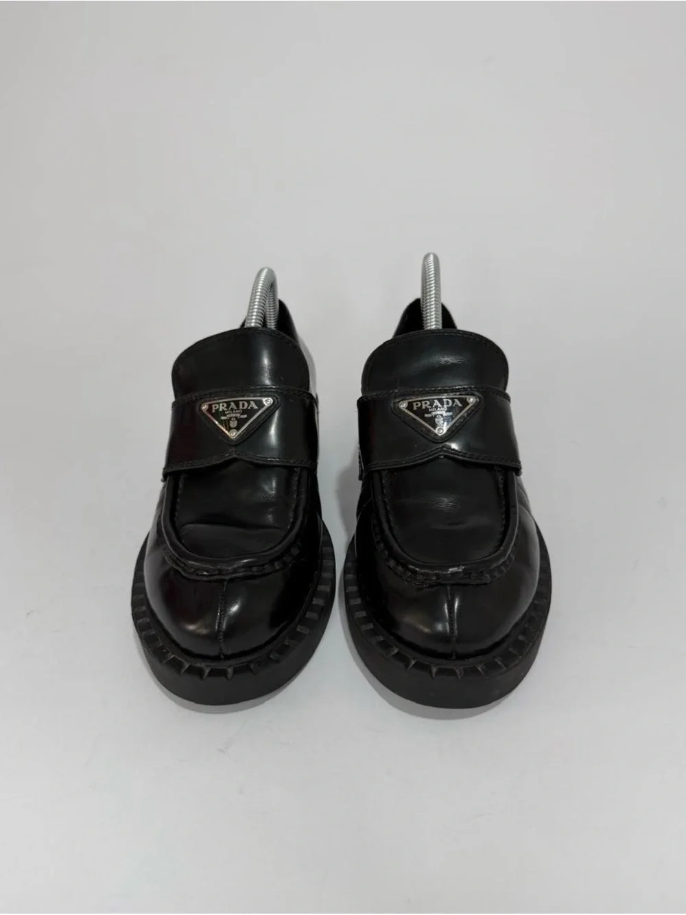 Prada Black Leather Loafers with Silver Triangle Logos - Picture 1 of 6